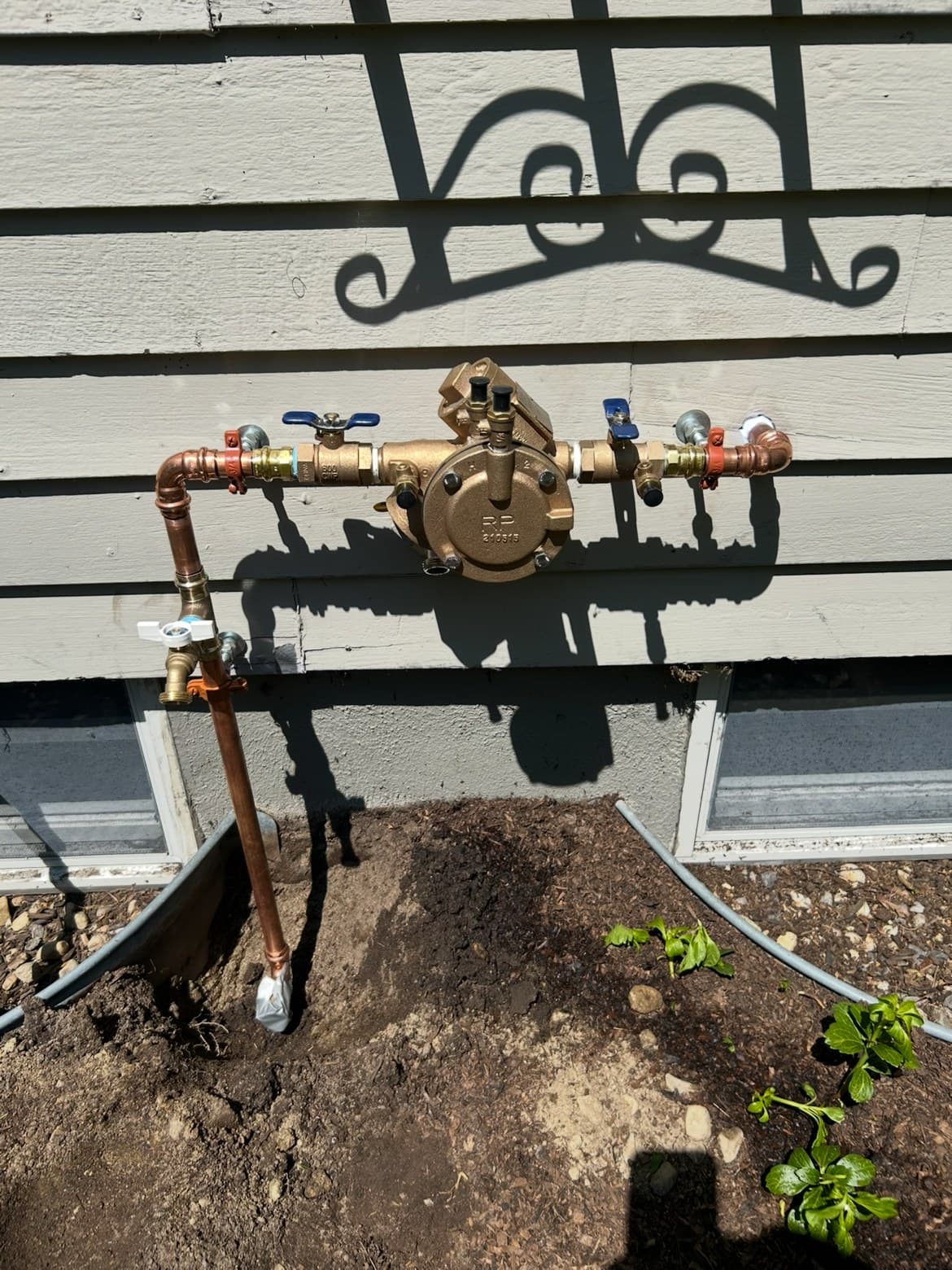 Outdoor backflow preventer (RP assembly) installation by Lucas Plumbing, greater Boston